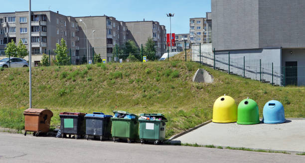 istock Garbage containers for the unassorted and sorted household garbage are installed near houses in the dormitory urban area.  Sorting of garbage allows to lower expenses and to preserve resources 807241862