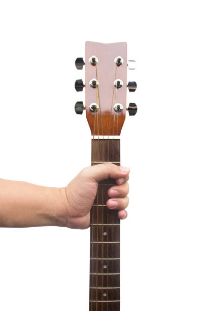 istock Hand Holding Guitar Isolated On White Background 807256562