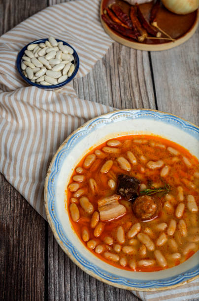 istock Stew of beans with chorizo and pork 807259218
