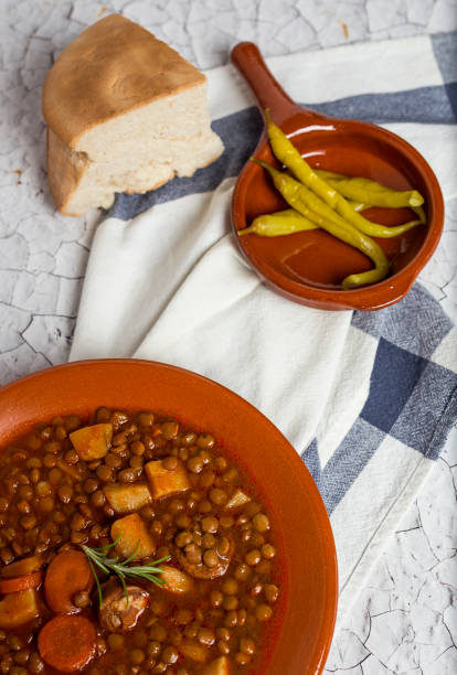 istock Stew of lentils with chorizo and pork 807263080