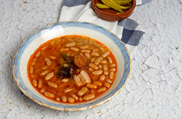 istock Stew of beans with chorizo and pork 807263714