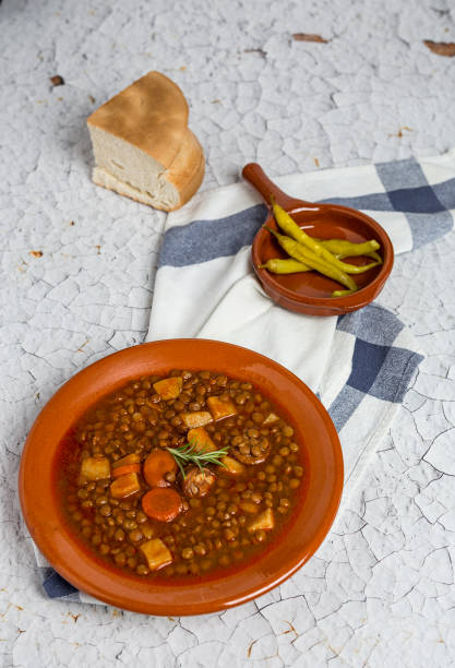 istock Stew of lentils with chorizo and pork 807263874