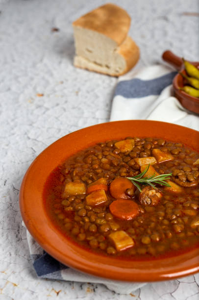 istock Stew of lentils with chorizo and pork 807263890