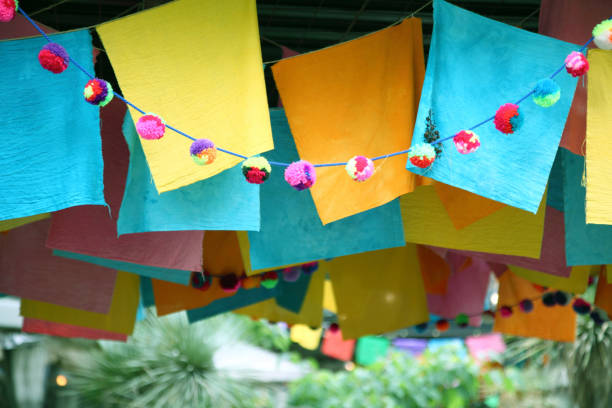 istock Multi colored flags in the garden party 807269138