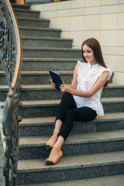 istock Business lady uses a tablet to work 807269446