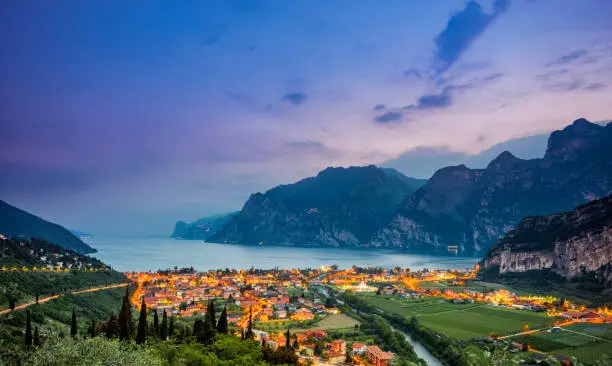 Elevated view on Nago-Torbole and Lake Garda at sunset