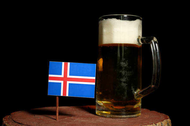 Icelandic flag with beer mug isolated on black background stock photo