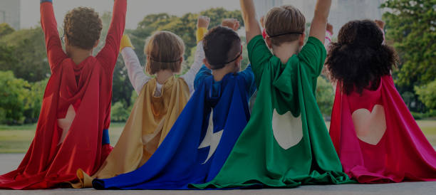 istock Superheroes Cheerful Kids Expressing Positivity Concept 807280396