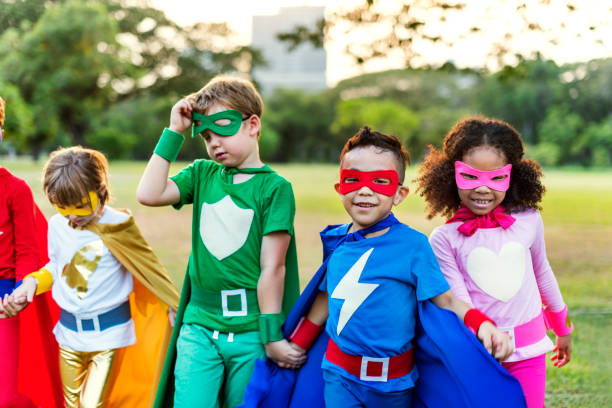 istock Superheroes Cheerful Kids Expressing Positivity Concept 807280454