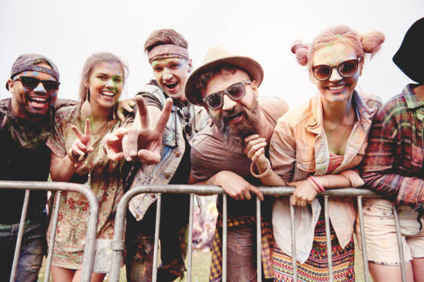 happy group of friends next to scene - costume stage costume sunlight carnival imagens e fotografias de stock