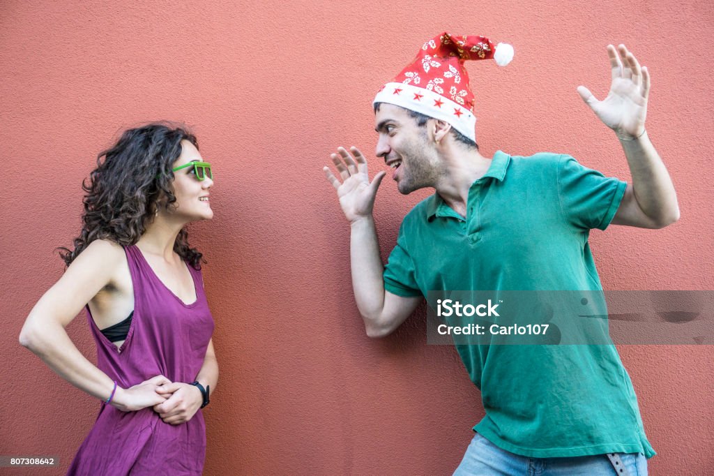 The grinch Grinch trying to scare a young woman Ebenezer Scrooge Stock Photo