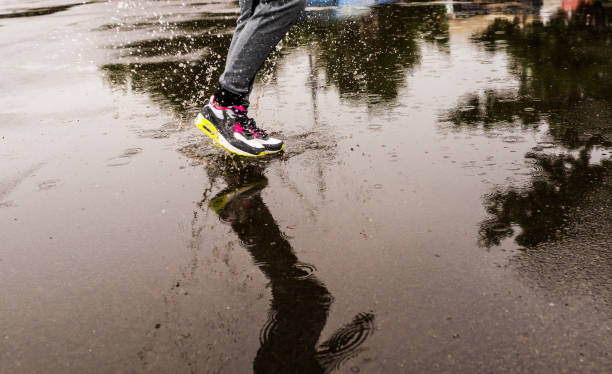 Deep Puddle Running 4,500+ Running Puddle Stock Photos, Pictures & Royalty-Free Images - iStock