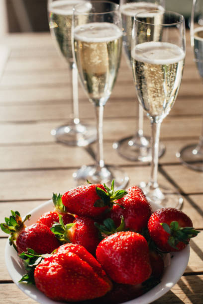 istock Champagne in a glass with strawberries 807319684