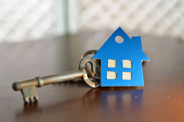 istock Bunch of keys with house shaped cardboard 807349542
