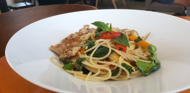istock Black pepper chicken breast meat with spaghetti 807371000