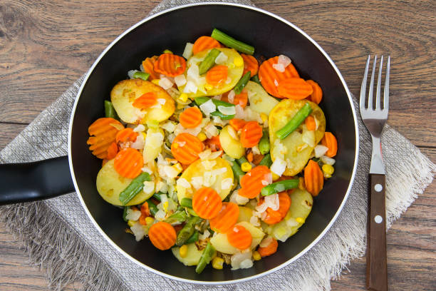 istock Food without meat:fried vegetables in frying pan 807379878