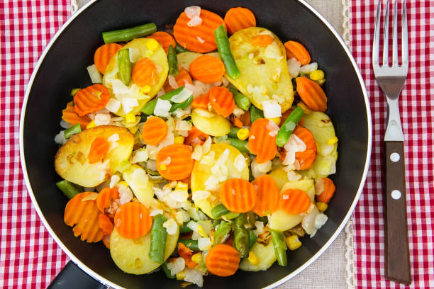 istock Food without meat:fried vegetables in frying pan 807381948