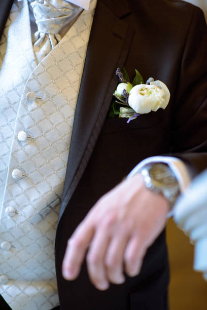 istock Handsome groom in suit in the hall 807388204