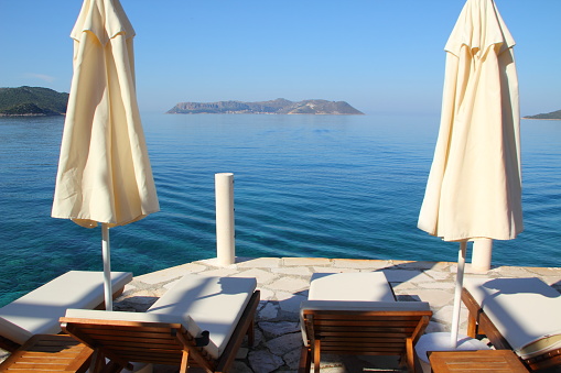 beautiful hotel beach with sunchairs in kas turkey