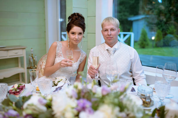 istock Beautiful wedding couple in restaurant 807405086