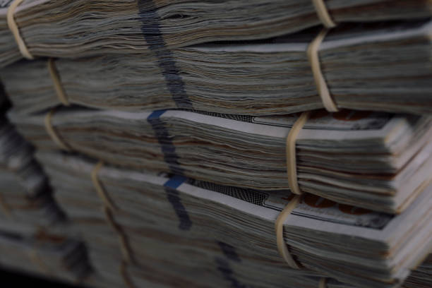 istock Pile of cash 807409086