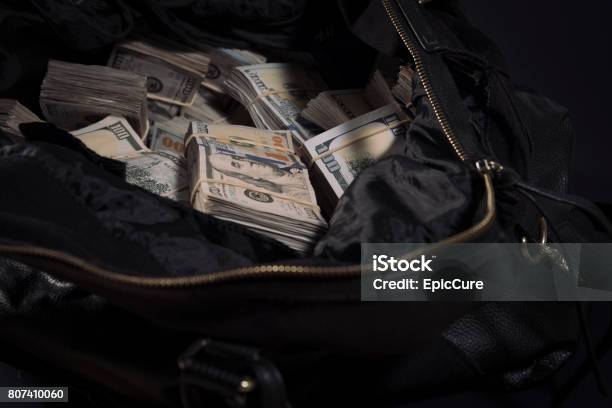 Duffel Bag Bag With Cash Stock Photo - Download Image Now - Currency, Dollar Sign, US Paper Currency