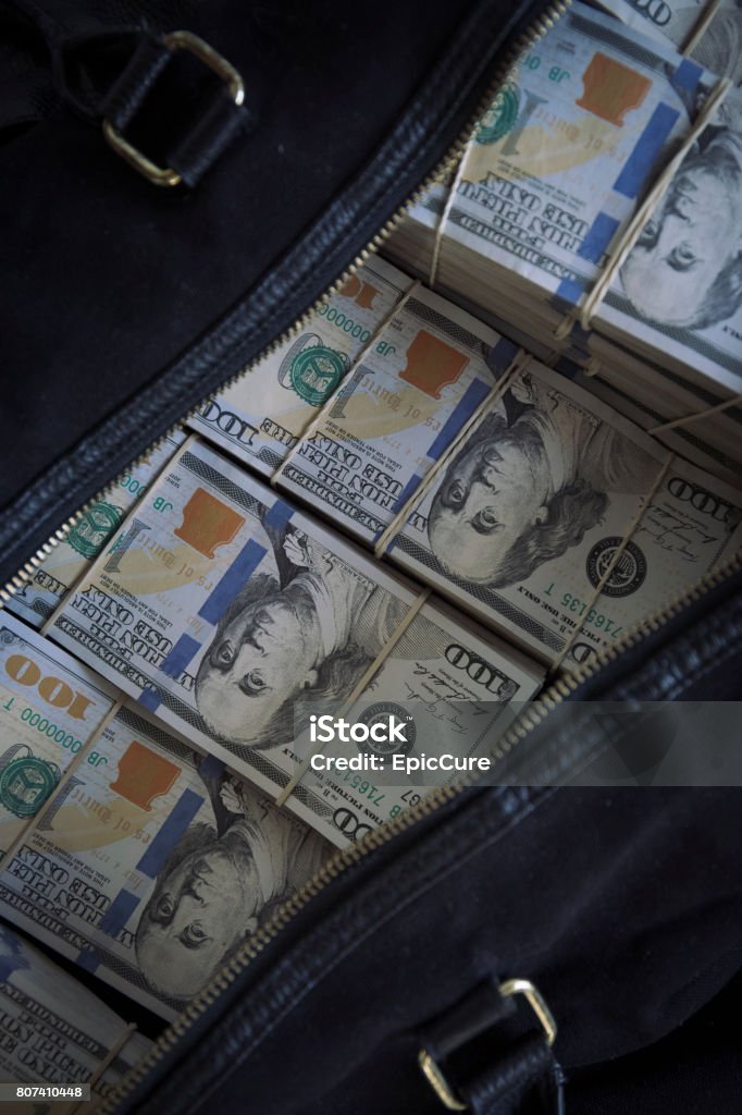 Duffel Bag Bag With Cash Stock Photo - Download Image Now - Abundance,  American Culture, American One Hundred Dollar Bill - iStock