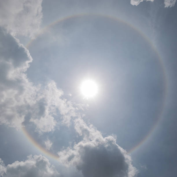 istock The sun halo (optical phenomena) with cloudy sky in background, natural phenomenon. 807415768