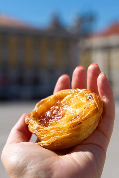 istock portuguese dessert pastel de nata on hand 807418668