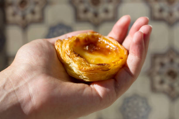 istock portuguese dessert pastel de nata on hand 807418686