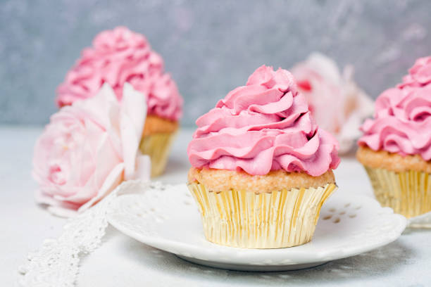 istock Pink Wedding cake with roses and macaroons. Holiday celebration concept. Top view, flat lay 807420174