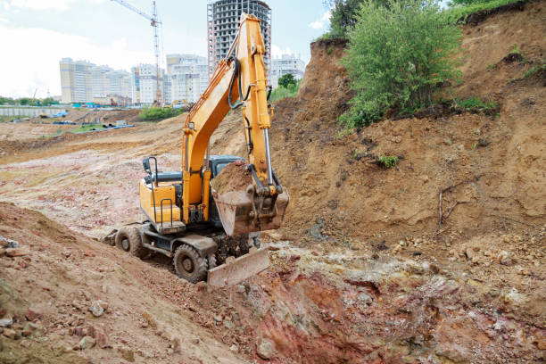 istock Excavator working on a construction site. The digging of the trench. 807429258