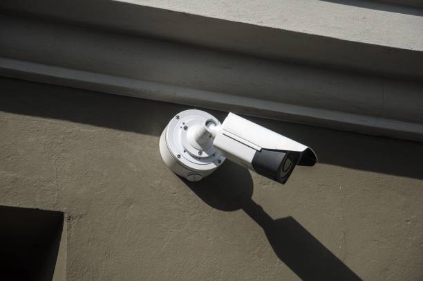 istock surveillance camera on side of the building 807439776