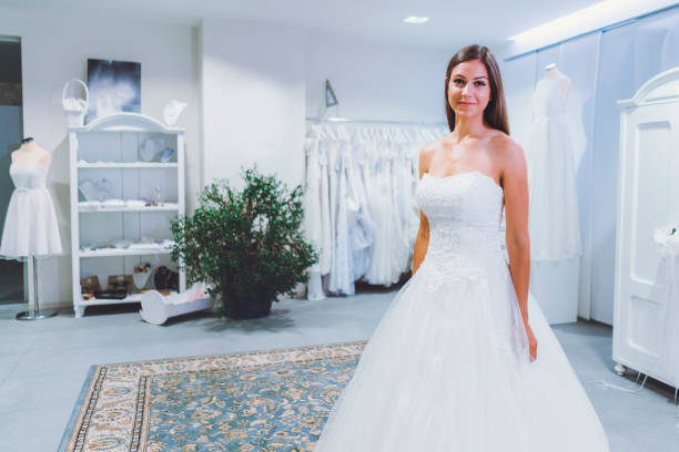 istock Trying On A Wedding Dress 807447908