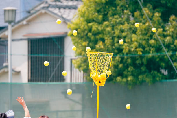 istock Ball toss of athletic meet 807452268