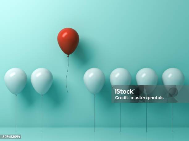 Stand Out From The Crowd And Different Concept One Red Balloon Flying Away From Other White Balloons On Light Green Pastel Color Wall Background With Reflections And Shadows 3d Rendering Stock Photo - Download Image Now
