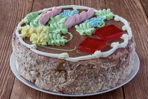istock Delicious cake dessert with cream and walnuts 807465878