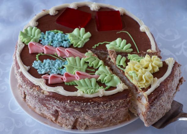 istock Delicious cake dessert with cream and walnuts 807467222