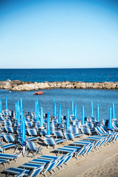istock Italian summer beach and paddleboat 807472188
