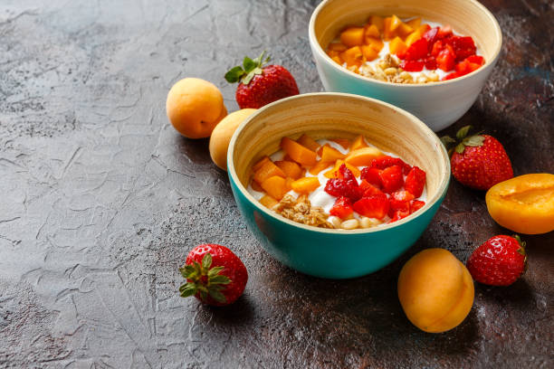 istock Homemade yogurt with granola, apricot and pine nuts 807472456