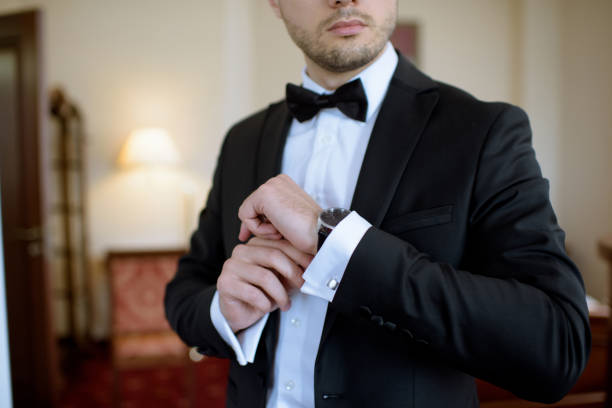 istock Groom is wearing a suit indoors 807481926