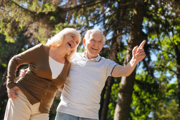 istock Smiling woman expressing positivity while standing near her husband 807500474