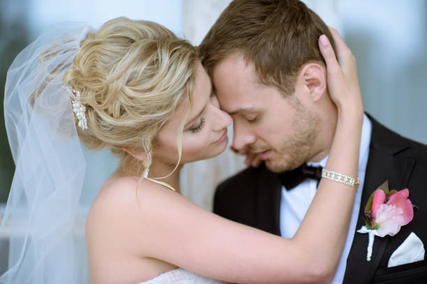 istock Wedding couple on the nature is hugging each other 807504946
