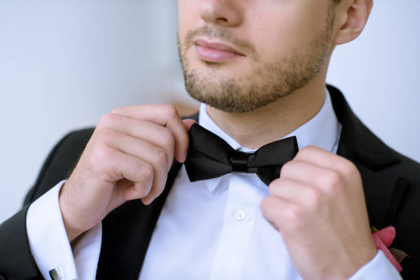 istock Handsome groom in suit in the nature 807530604