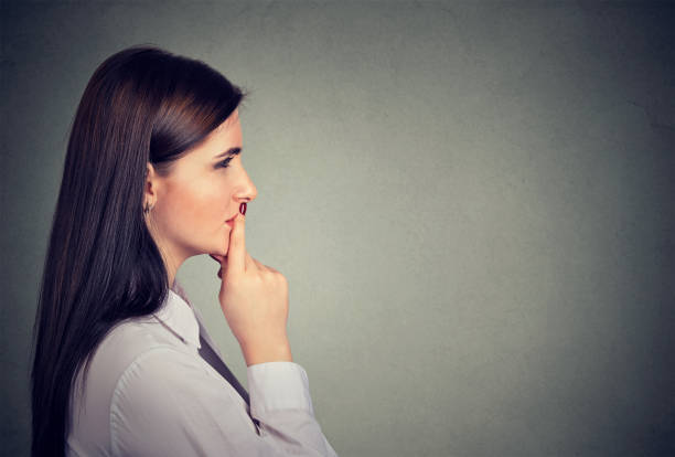 istock Side profile of a thoughtful young woman 807539476