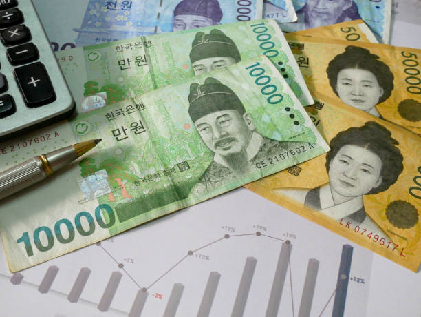 concepto de negocio de finanzas - korean currency fotografías e imágenes de stock