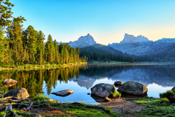 istock Early summer morning on mountain lake 807549122