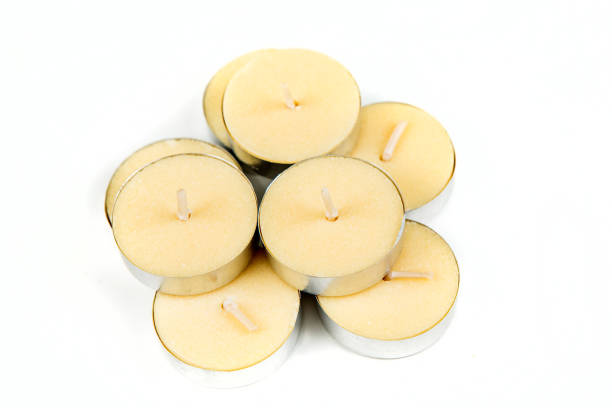 istock Scented wax votives isolated on a white background 807560042