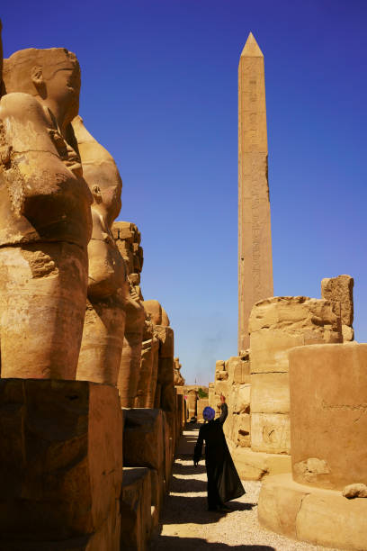 istock Obelisk and ruins in Karnak Temple 807584438