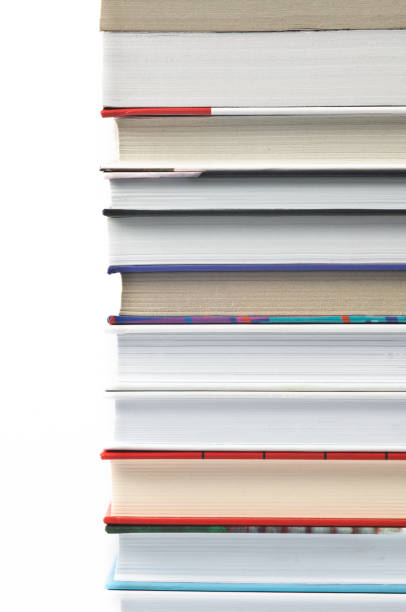 istock Books laid horizontally on a white background, aligned in a line 807661690